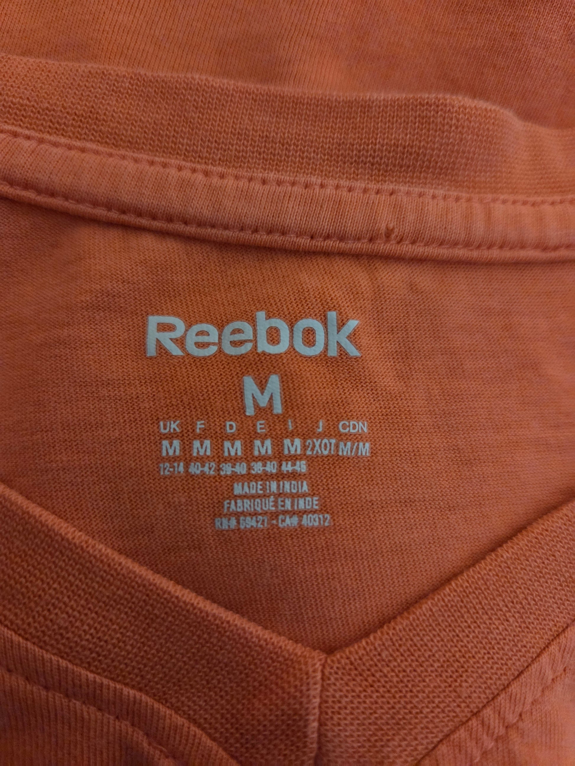 Close-up of a Reebok size label