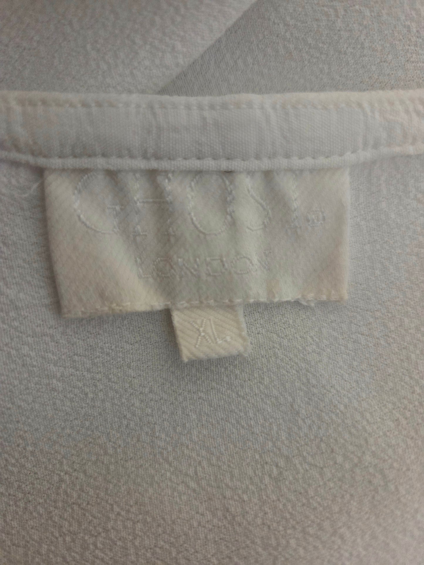 Close-up of Ghost size label