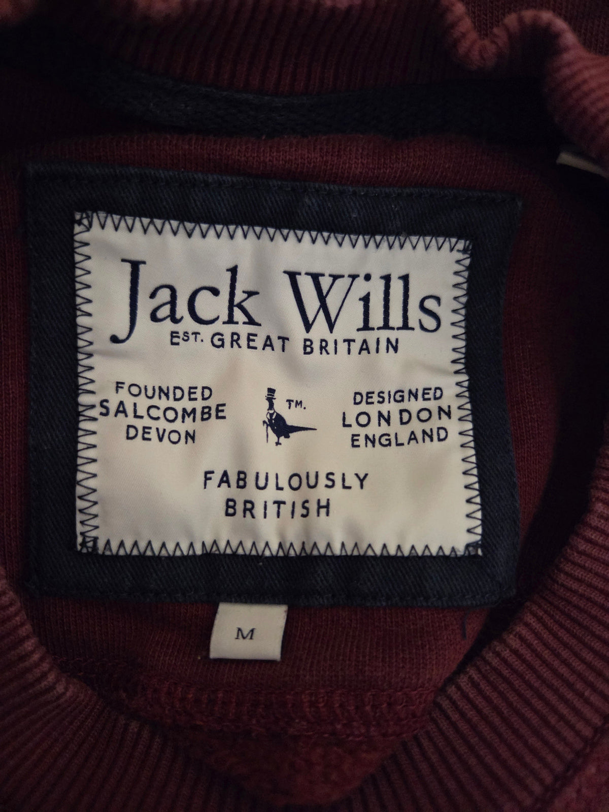 Jack Wills size label showing brand and M