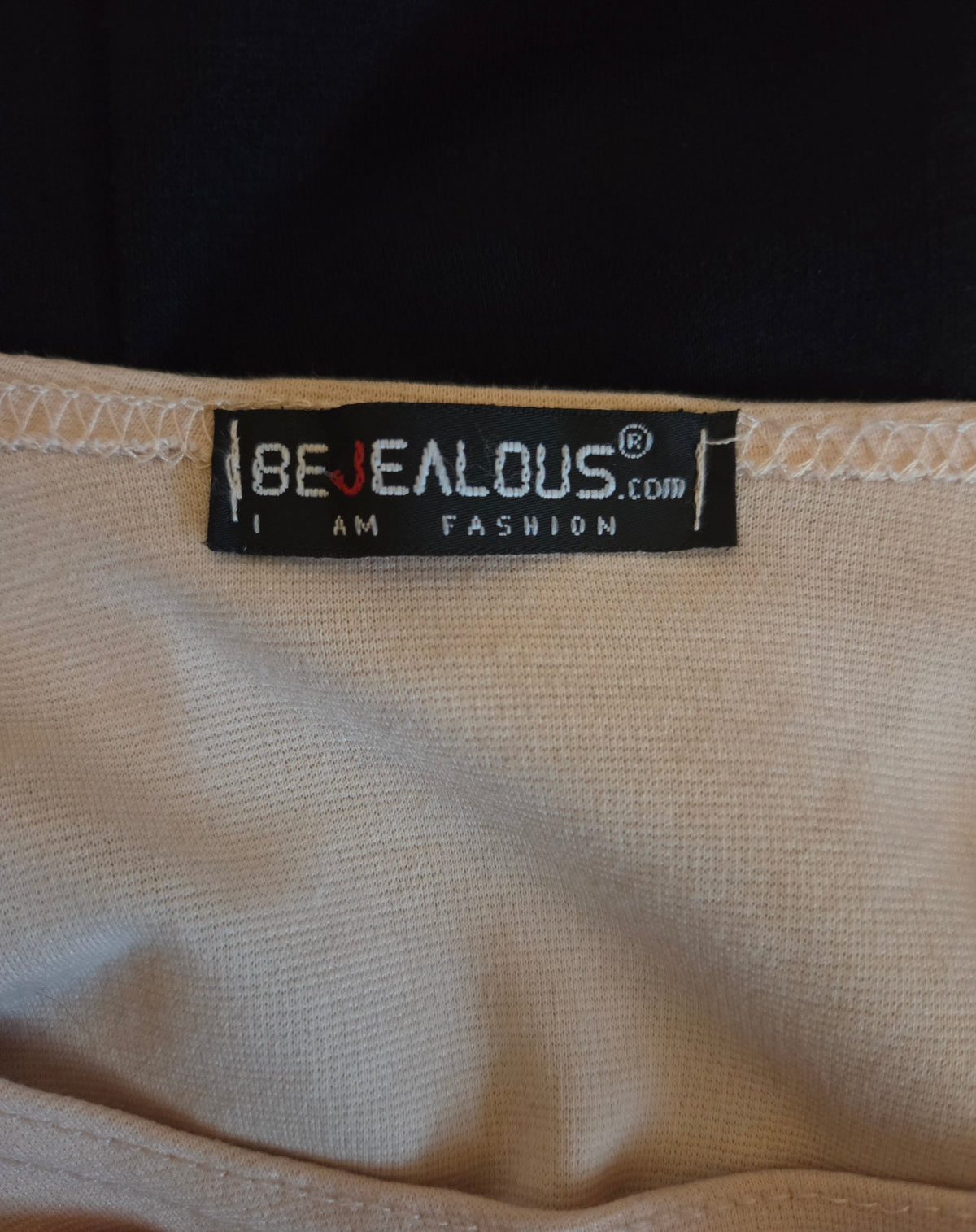 Close-up of a 'BeJealous' brand label 