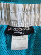 Close-up of Pro-Tone brand tag on a piece of fabric with blue mesh background