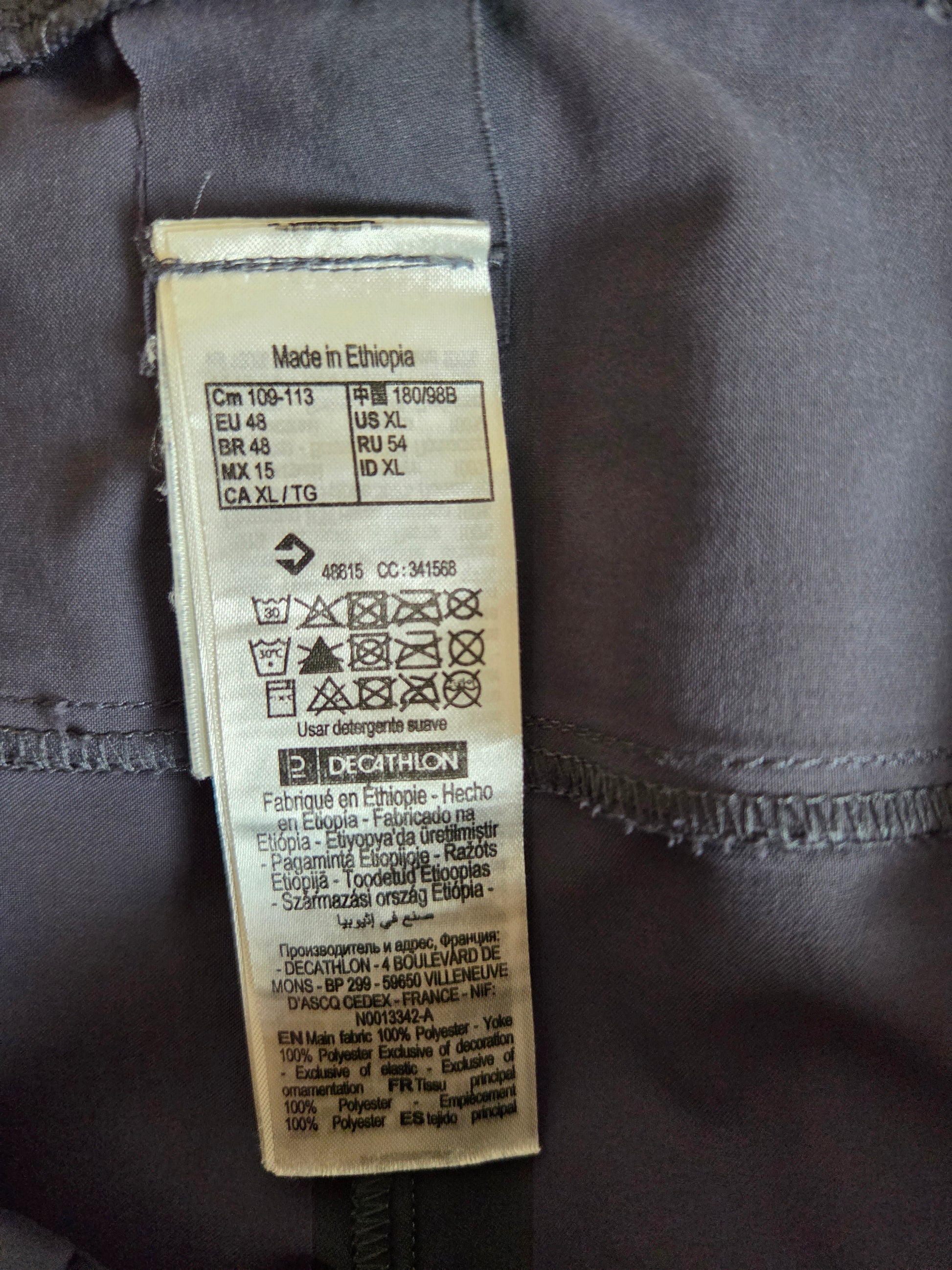 Clothing label on a dark fabric background