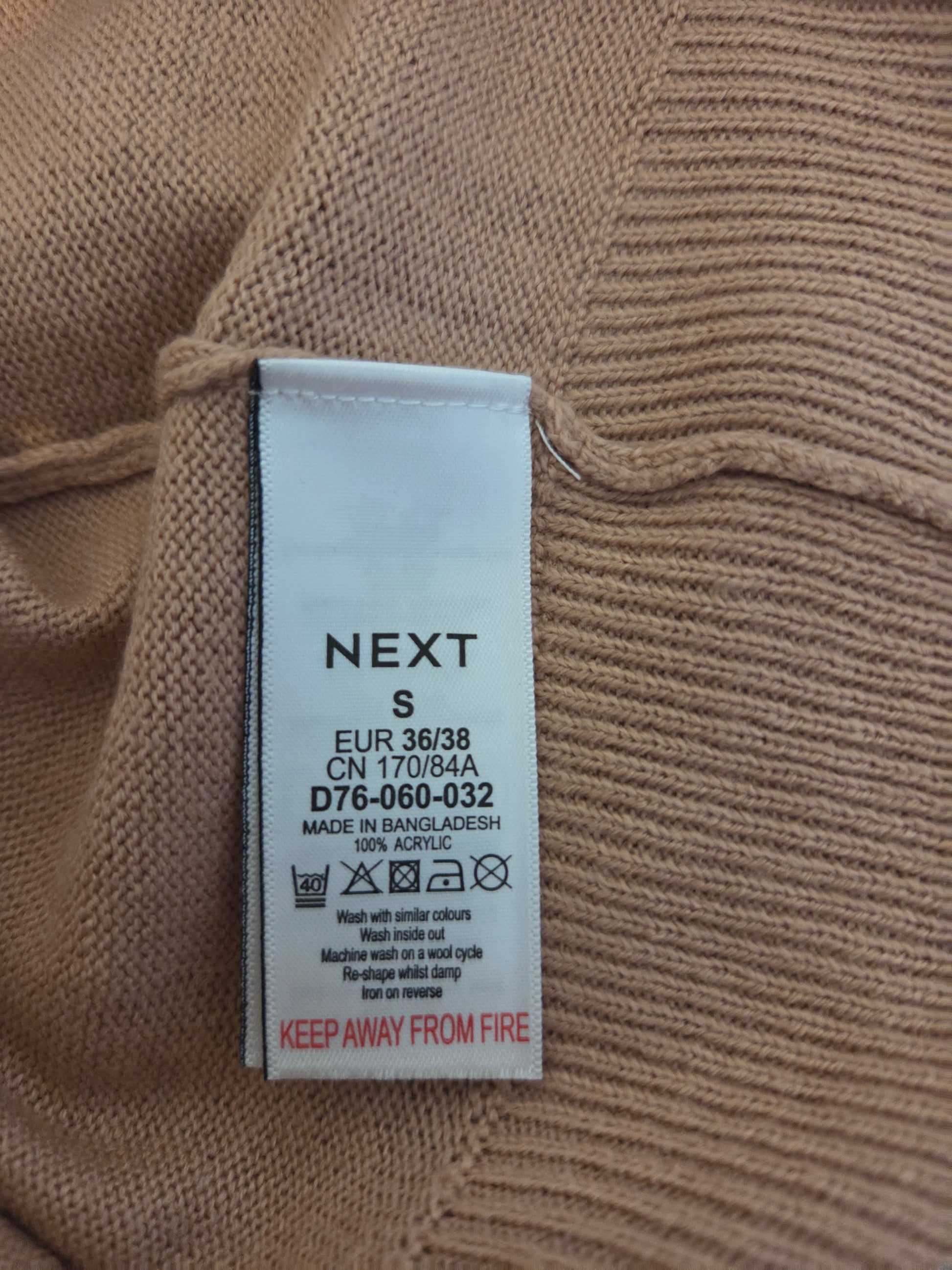 Close-up of a Next size label