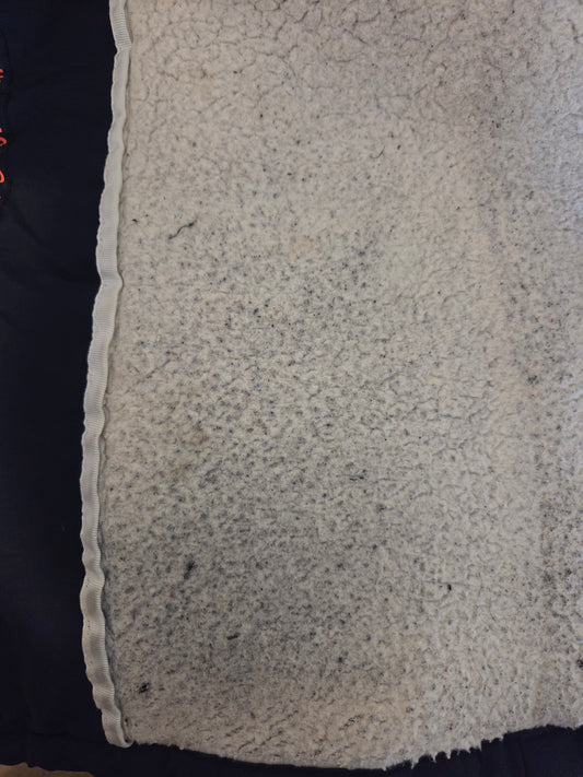 Close-up of a white fabric with some staining