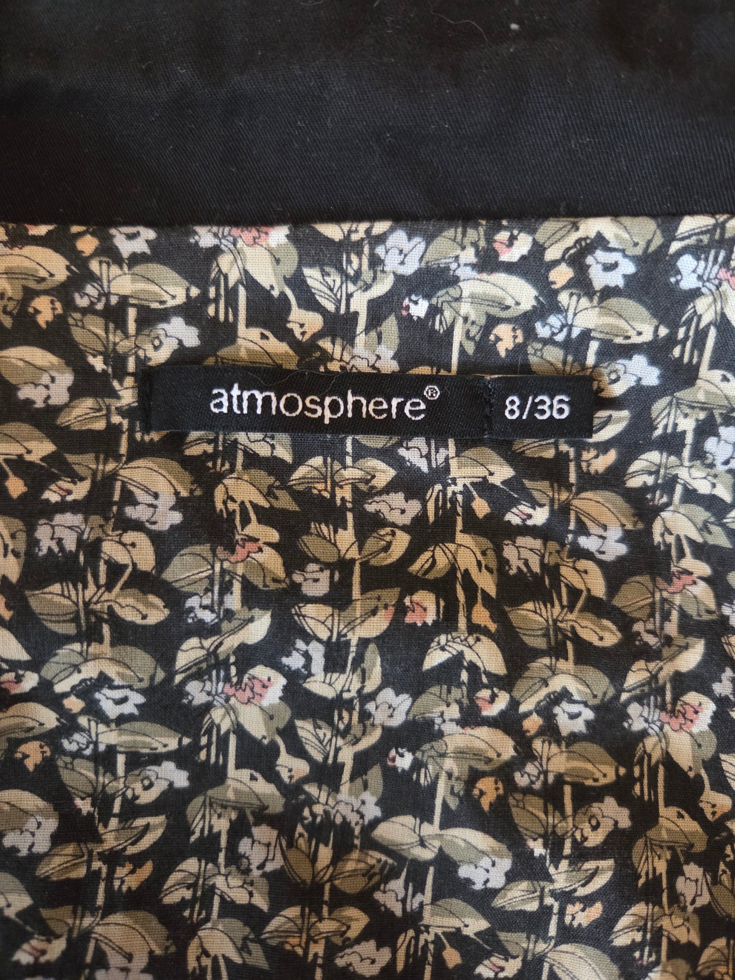 Floral patterned fabric with a size label