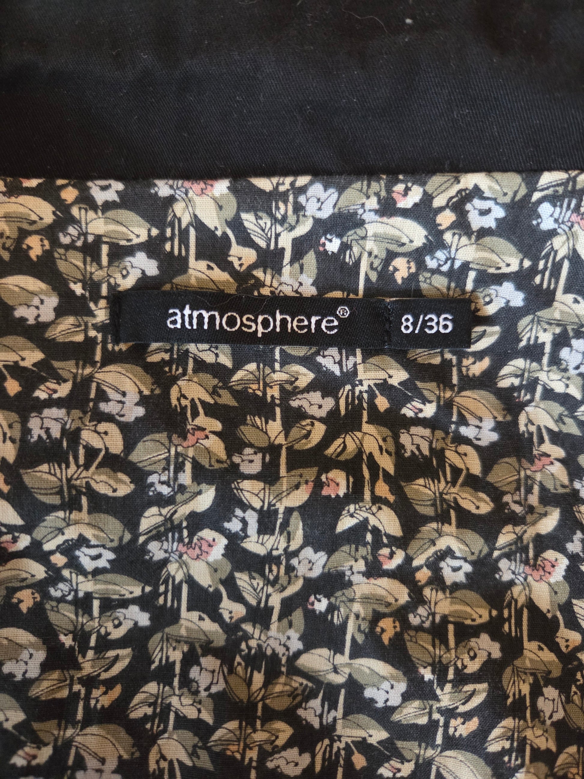 Floral patterned fabric with a size label