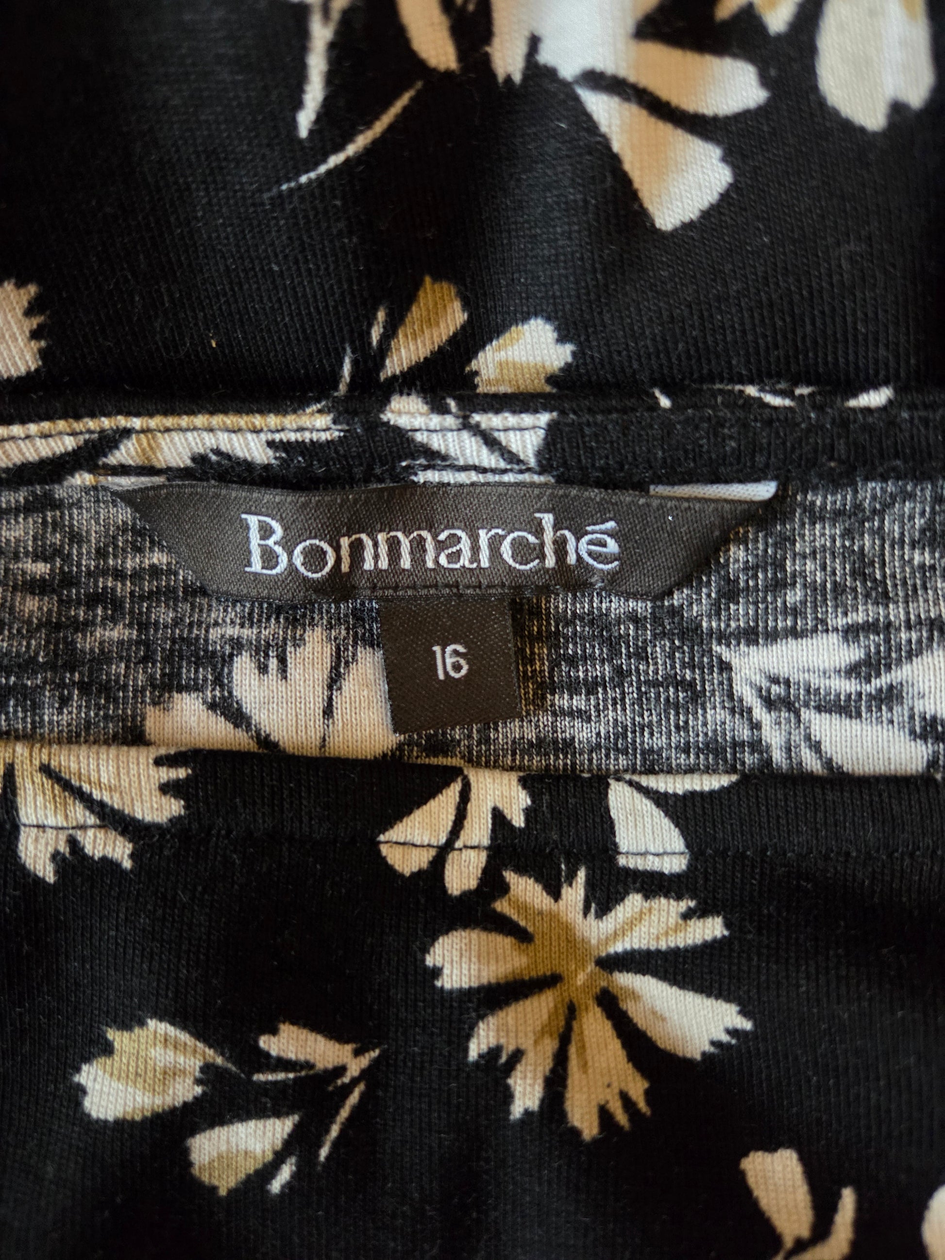Floral patterned fabric with Bonmarché label and size tag.