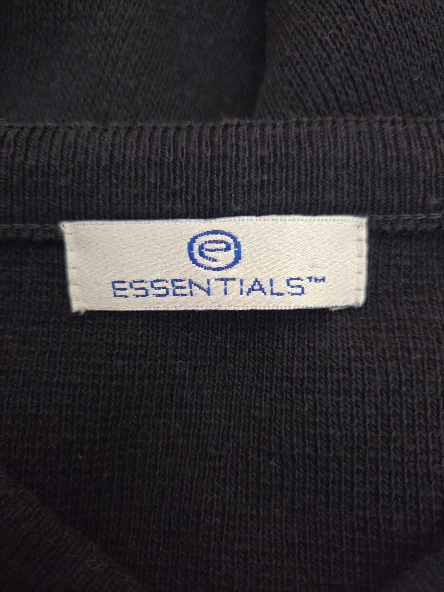 Size tag on a blue jumper