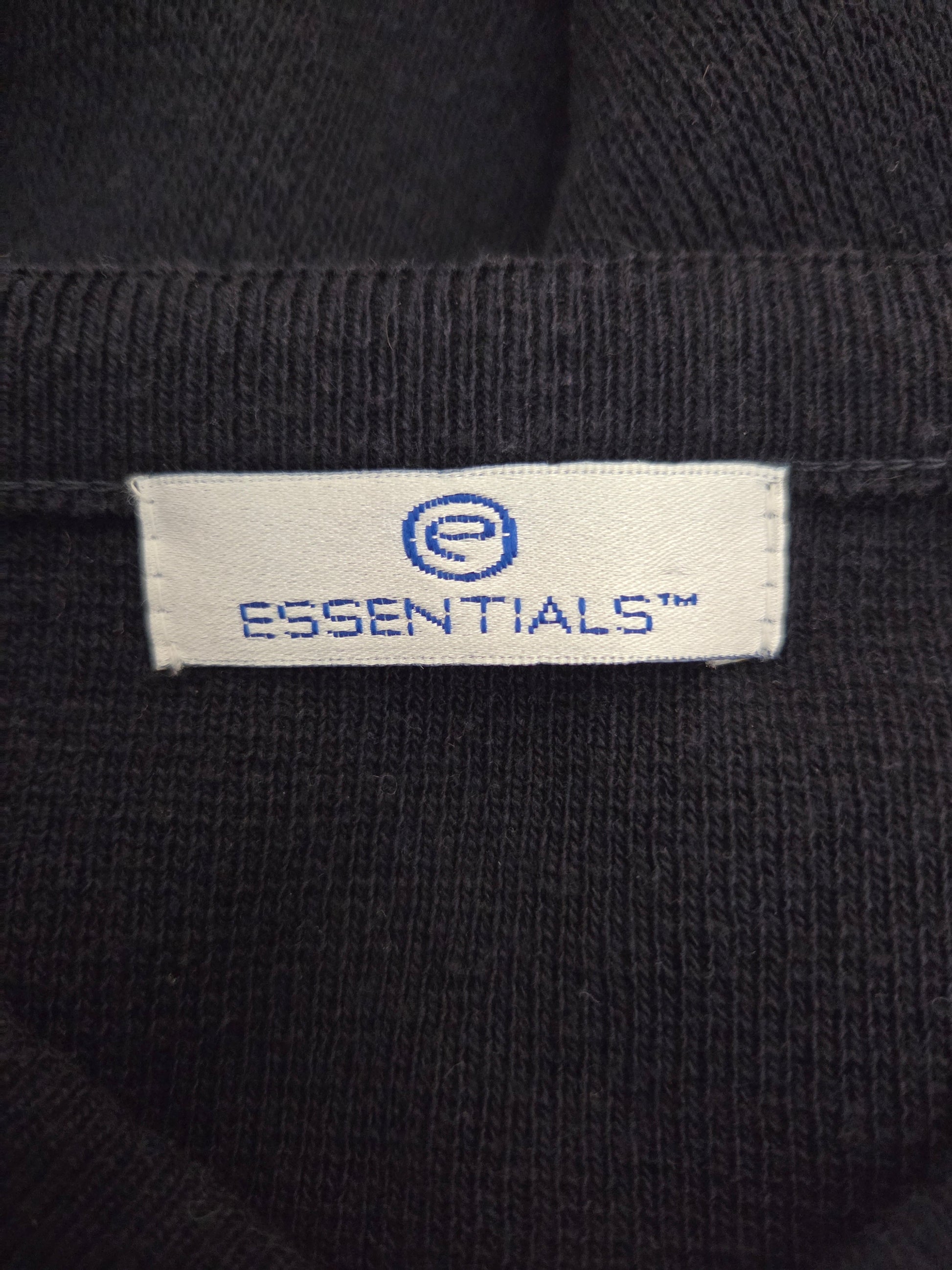 Size tag on a blue jumper