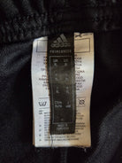 Close-up of an Adidas size tag 