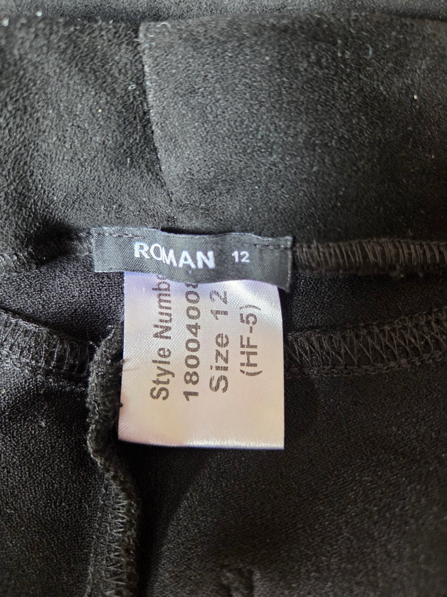 Size label on a pair of black jeans 