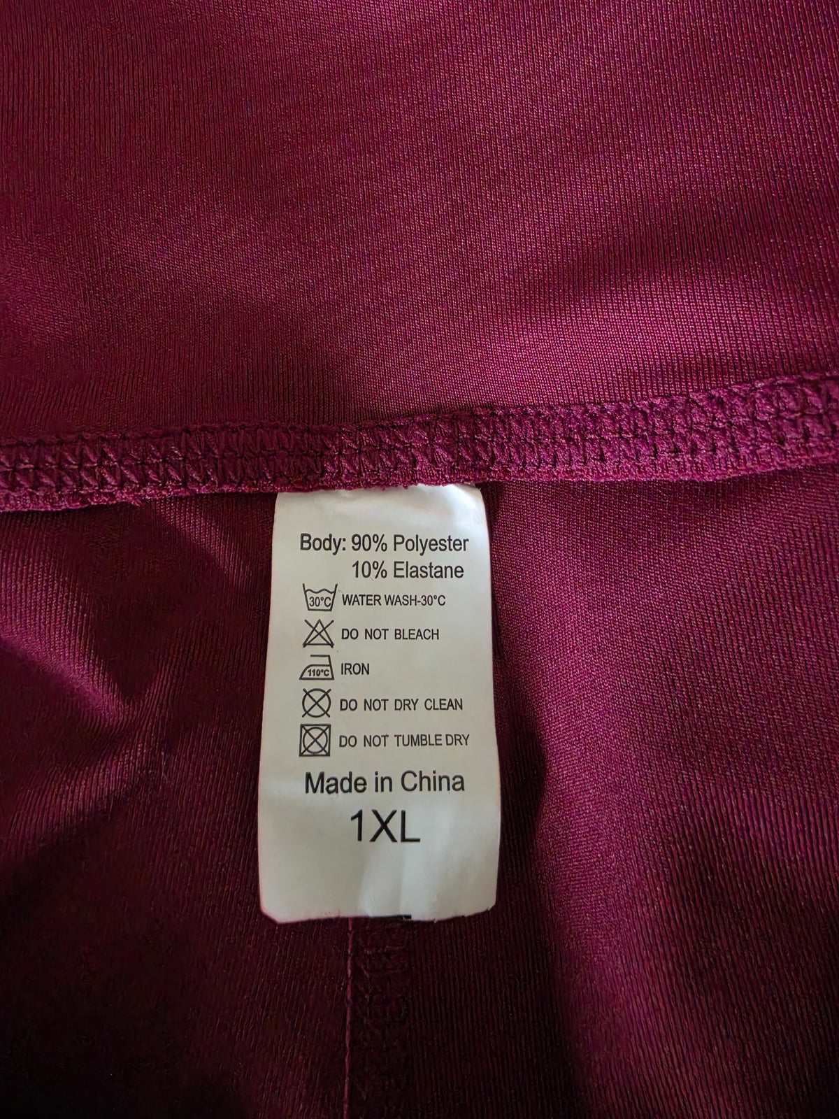 Close-up of a size label showing the 1XL size.