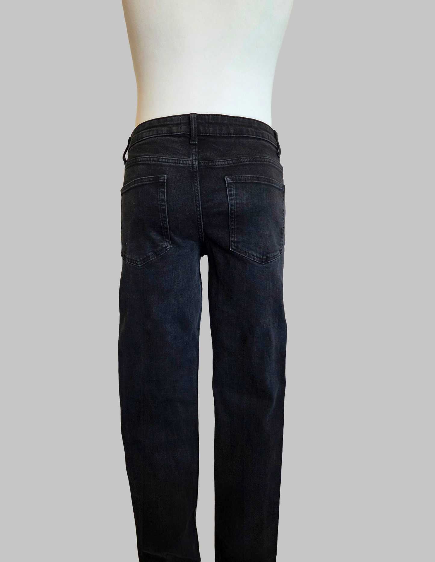 Back view of a pair of black jeans