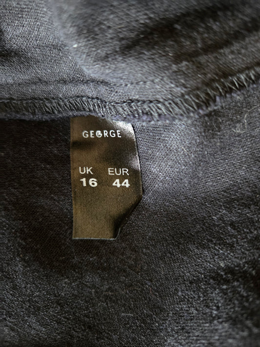 Size tag on a dark fabric with brand name 'GEORGE'.