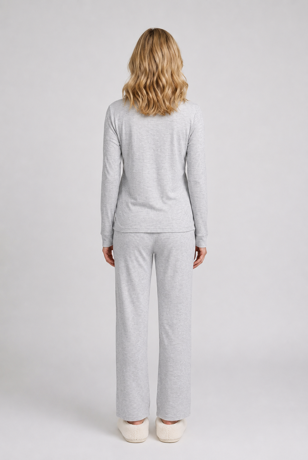 Woman wearing a grey pajama 