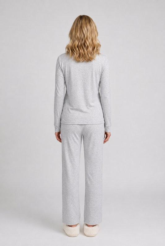 Woman wearing a grey pajama 