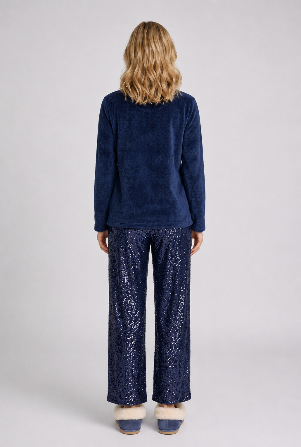 Woman wearing navy fleece pajama 