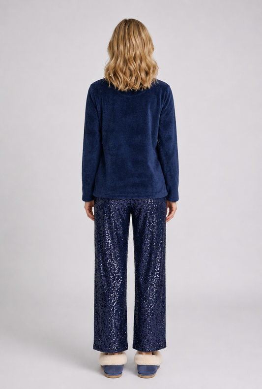 Woman wearing navy fleece pajama 