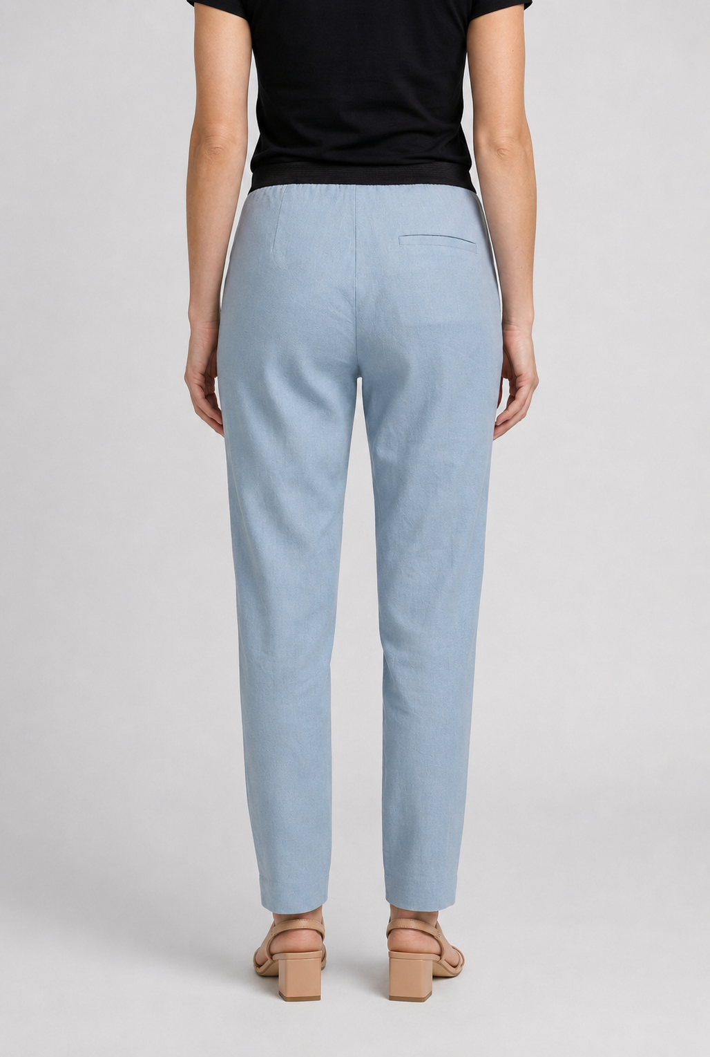 Light blue pants worn by a woman 