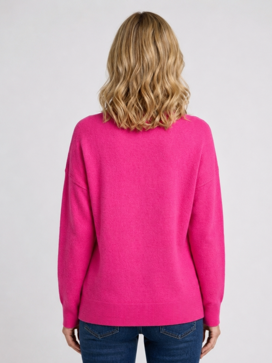 Person wearing a bright pink sweater back view