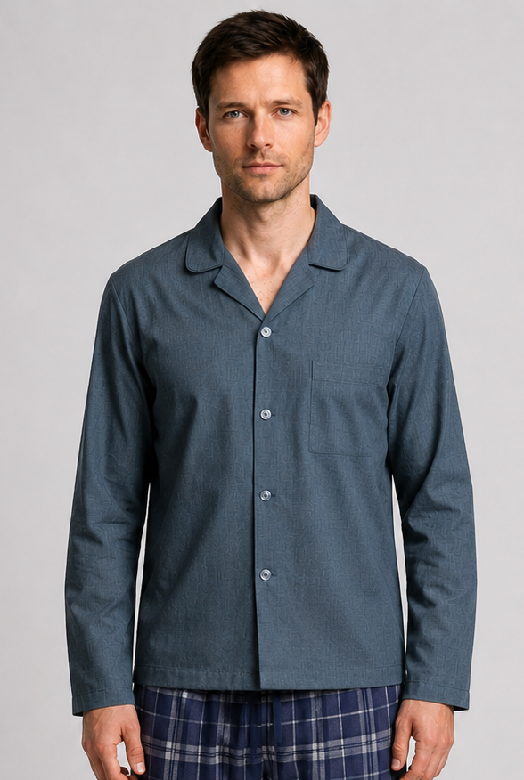 Man wearing a teal pyjama long sleeve top