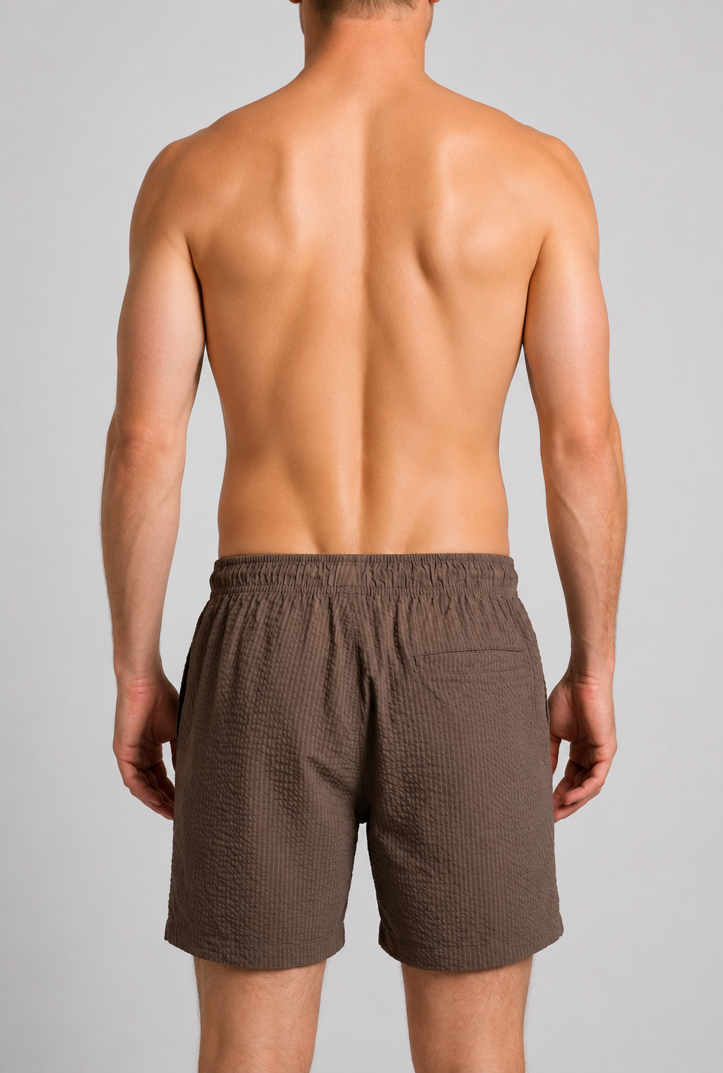 Back view of brown swim shorts