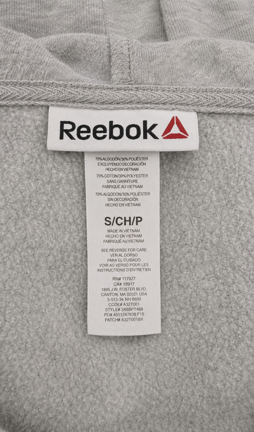 Grey Reebok sweatshirt with size label 