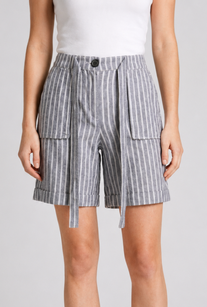 Person wearing blue striped shorts 