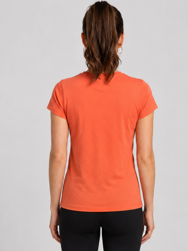 Woman wearing an  reebok orange t-shirt back view