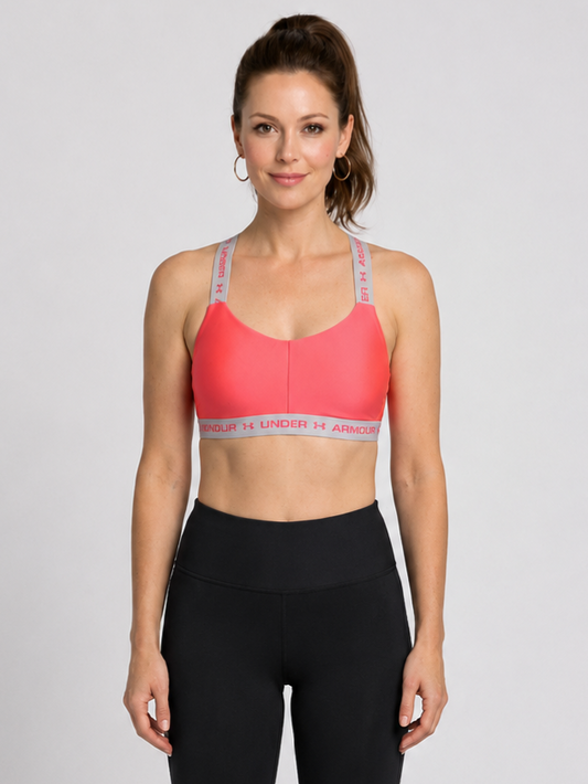 Women wearing Under Armour pink sports bra