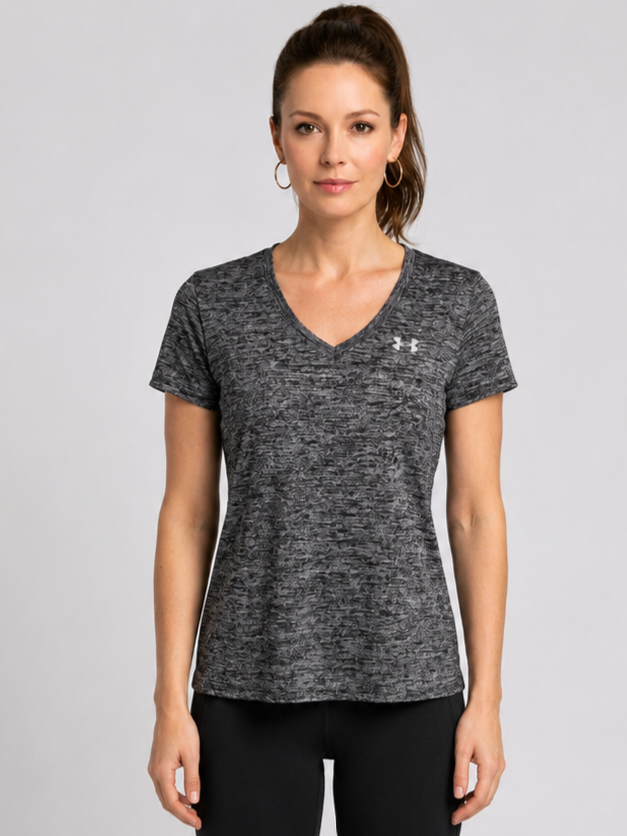 Woman wearing a gray Under Armour t-shirt 