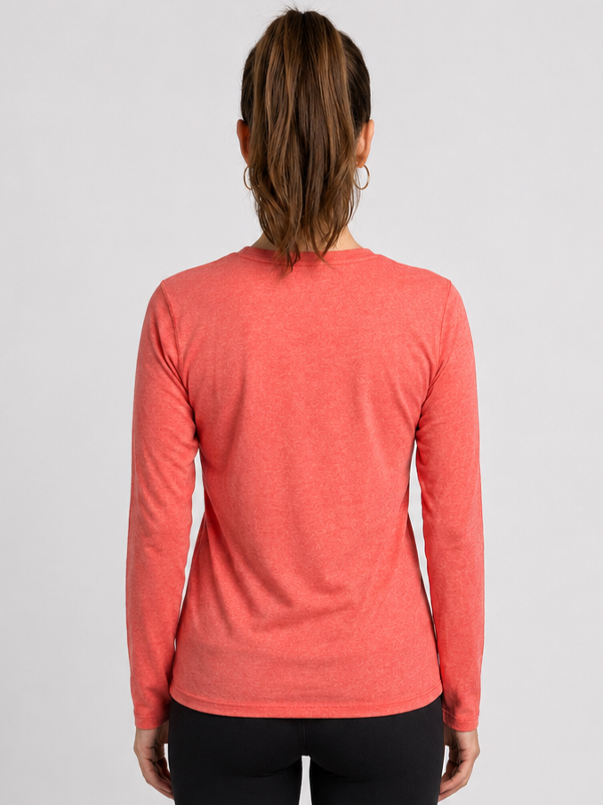 Person wearing a orange long-sleeve top