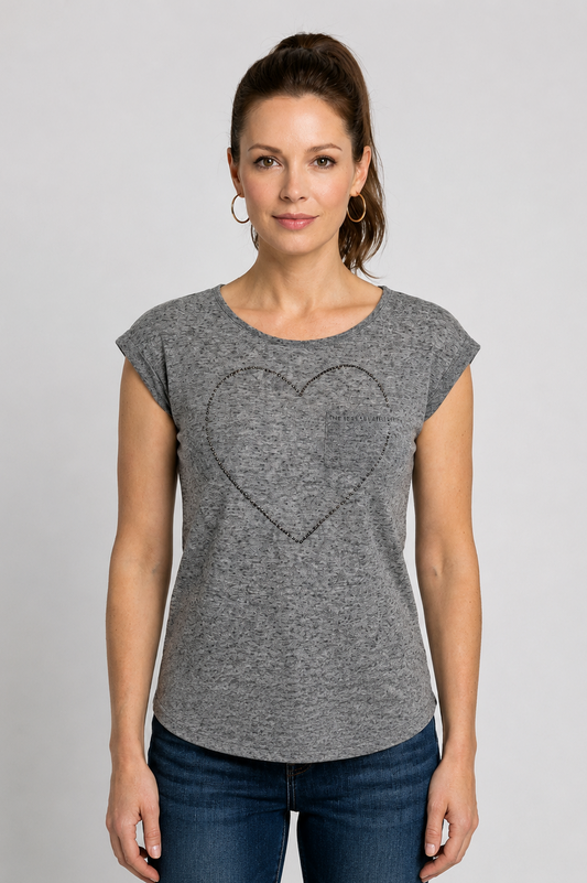 Woman wearing a grey t-shirt with a heart design 