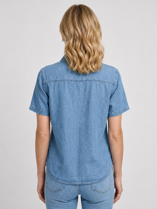 Woman wearing a blue shirt and jeans 