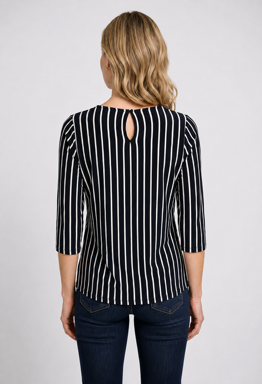 Woman wearing a navy and white striped top 
