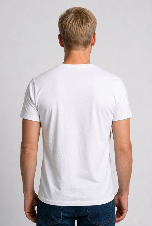 Man wearing a plain white t-shirt and dark jeans