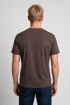 Man wearing a brown t-shirt 