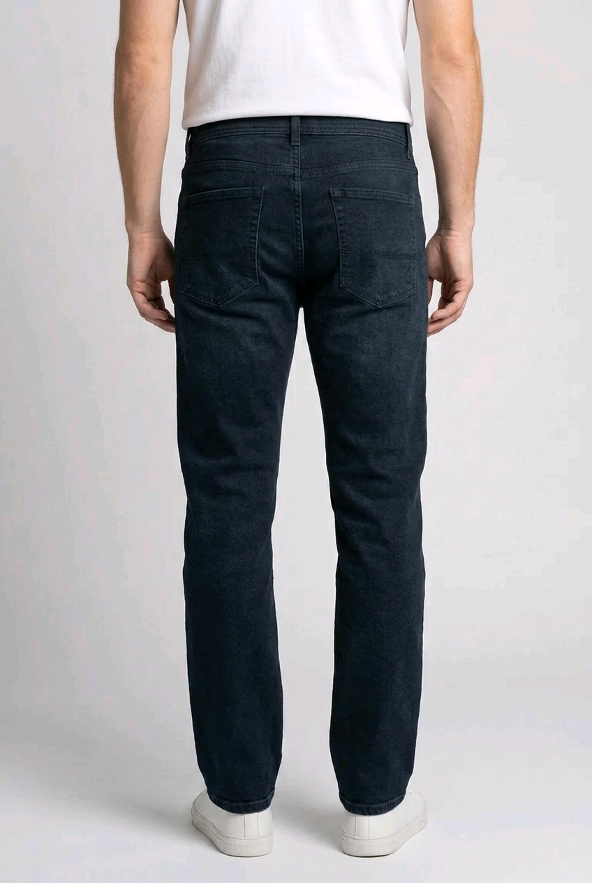 Man wearing dark blue jeans  back view