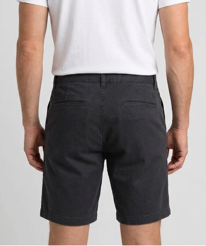 grey shorts and a white t-shirt back view