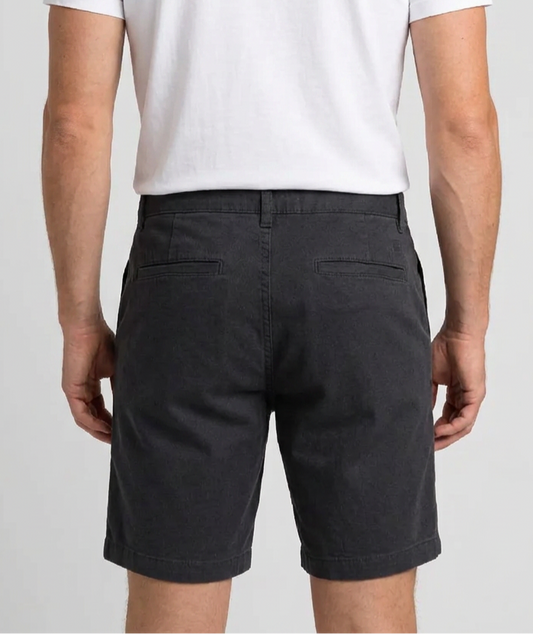 grey shorts and a white t-shirt back view