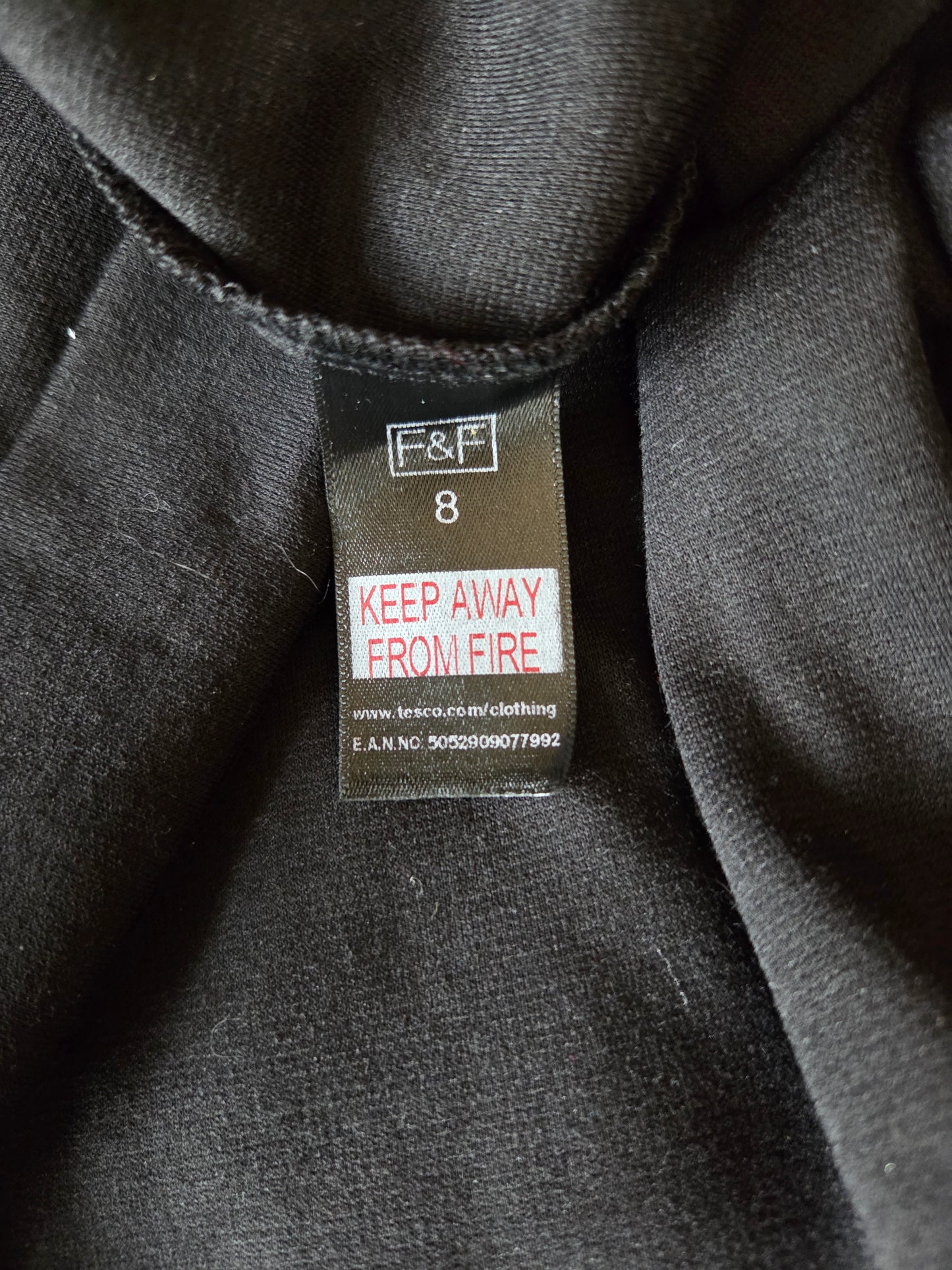 Black dress label inside fabric