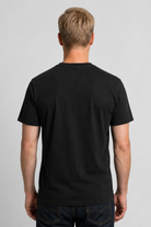 Man wearing a black t-shirt 