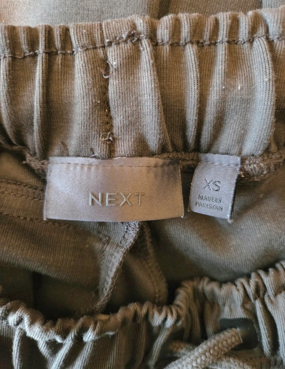 Next label showing the brand 