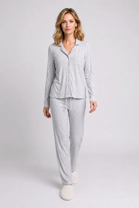 Woman wearing a light grey pajama set