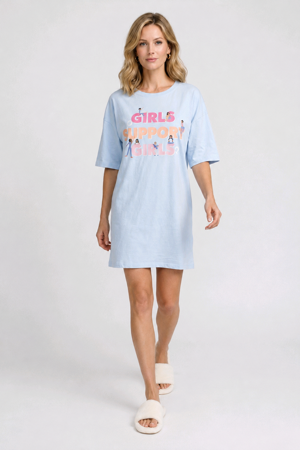 Woman wearing a light blue nightdress with text and graphics 