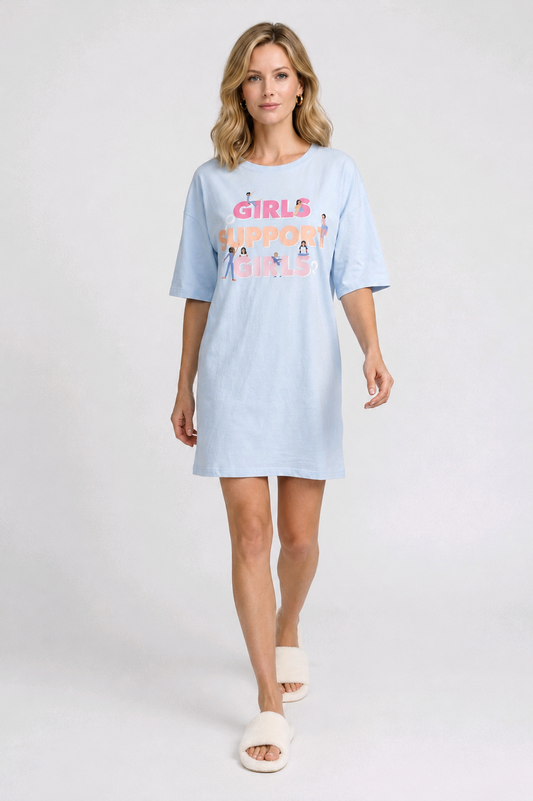 Woman wearing a light blue nightdress with text and graphics 
