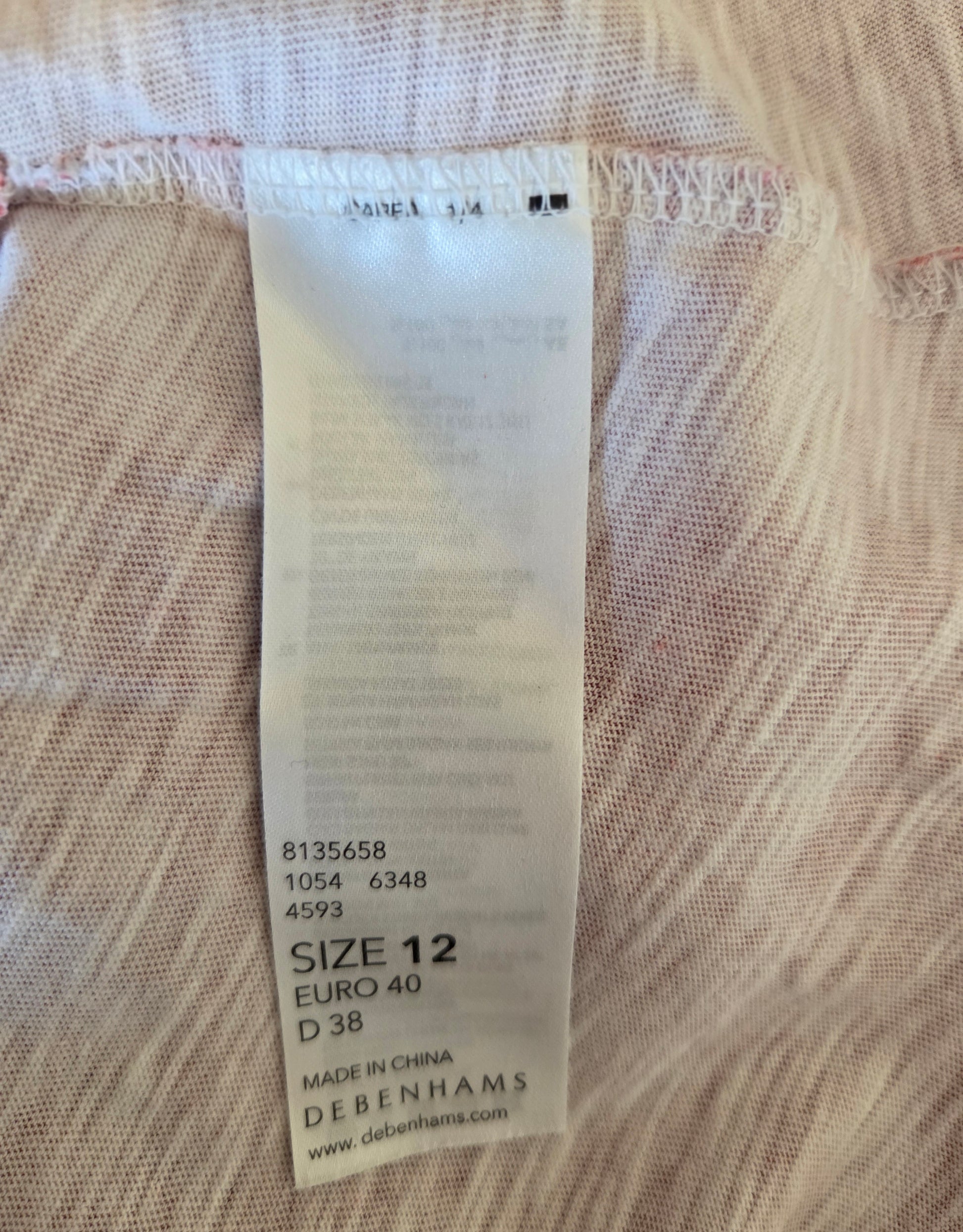 Debenhams clothing tag with size information 