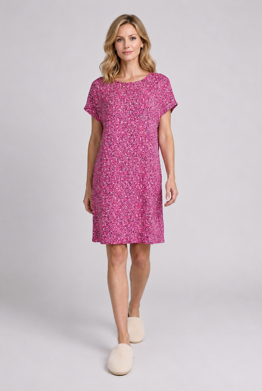 Woman wearing a pink patterned nightdress