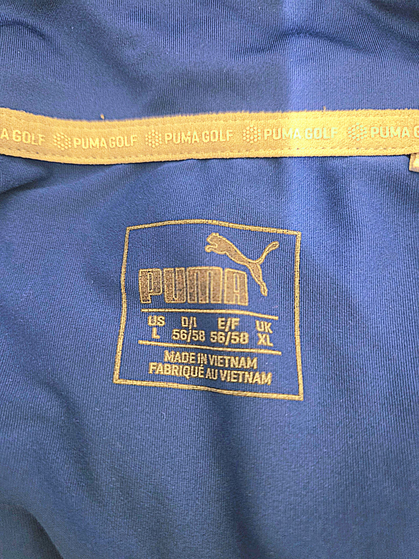 Size label on a blue t shirt